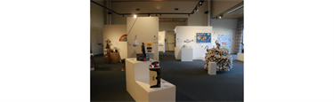 Assorted artworks created with packaging materials